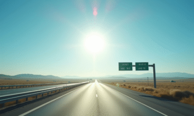 Autoroute en plein jour avec panneaux kilométriques et miles